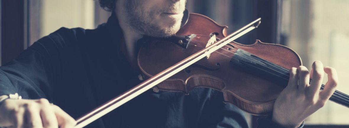 Picture of a man playing a violin