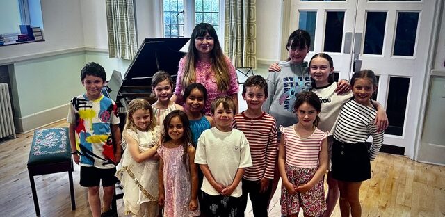 Ramona, singing teacher, Oxford with her young solo vocal students